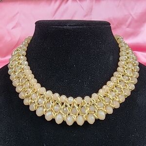 Elegant Gold and Cream Beaded Necklace